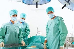 Team of Surgeons in Operating Room